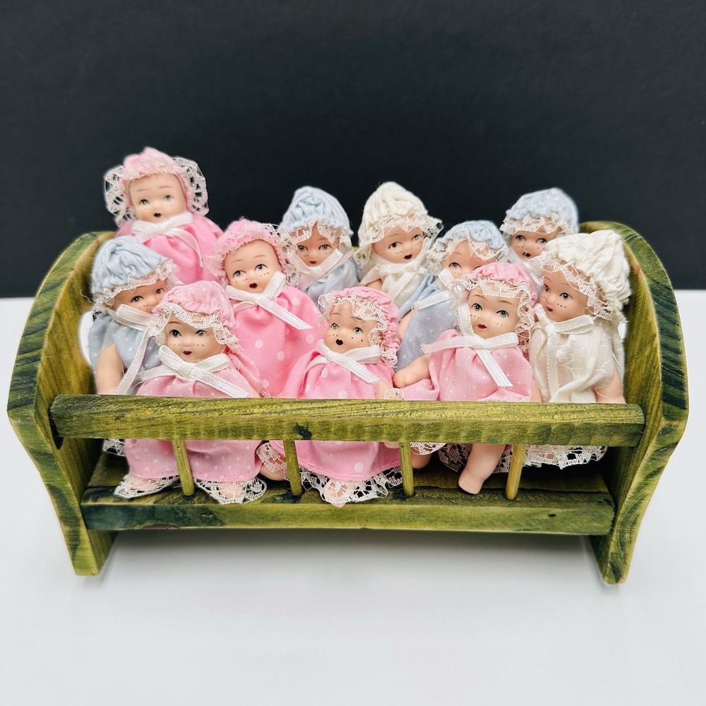 Lot of 11 Miniature Porcelain Jointed Doll Hand Painted with Vintage Wood Cradle